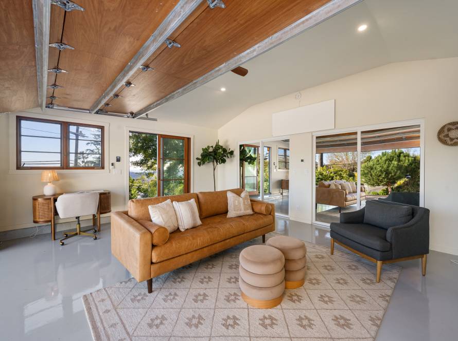 a-living-room-filled-with-furniture-and-a-brown